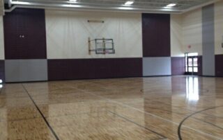 Gym at the Delton Kellogg High School in Delton Michigan. Professional painting completed by H&H Painting, a painting company in Grand Rapids Michigan and Kalamazoo Michigan.