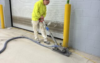 Employee working on improving commercial flooring