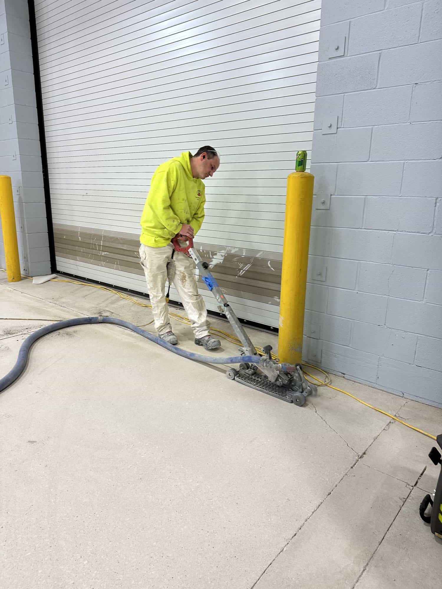 Employee working on improving commercial flooring