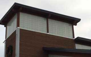 why is exterior paint peeling on commercial buildings
