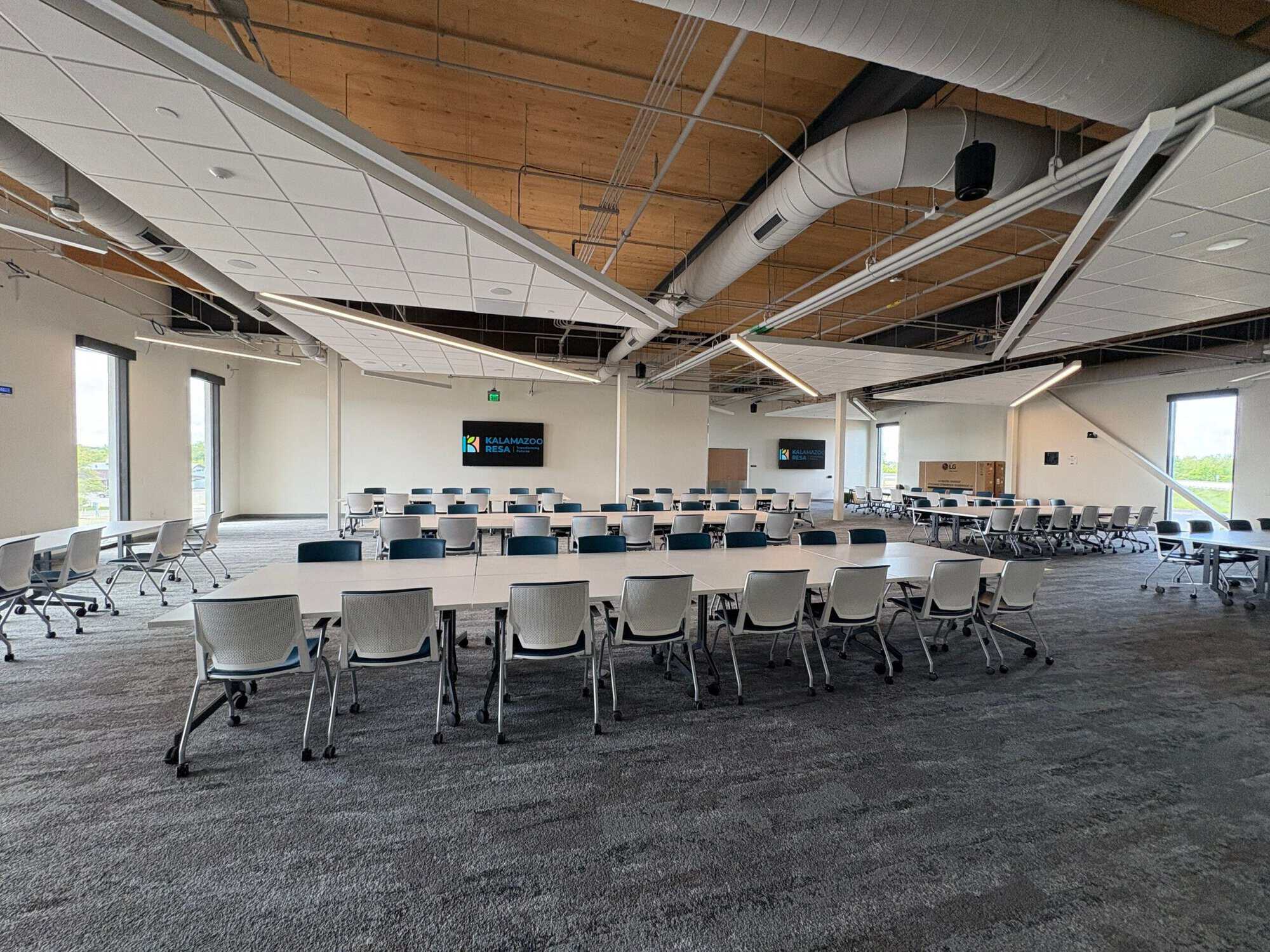Conference Room Exposed mass timber decking, ductwork, and MEP components coated by H&H Painting in a KRESA Career Connect Campus training room